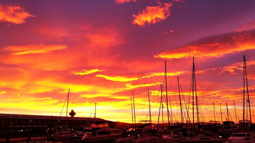 Pink and orange skies over Hobart harbour