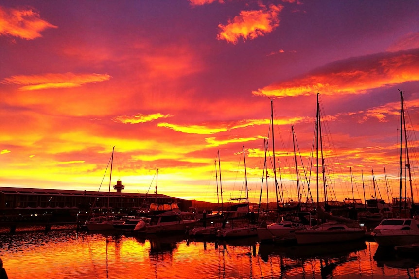 Pink and orange skies over Hobart harbour