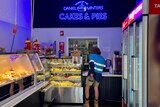 Blue fluorescent light-filled bakery