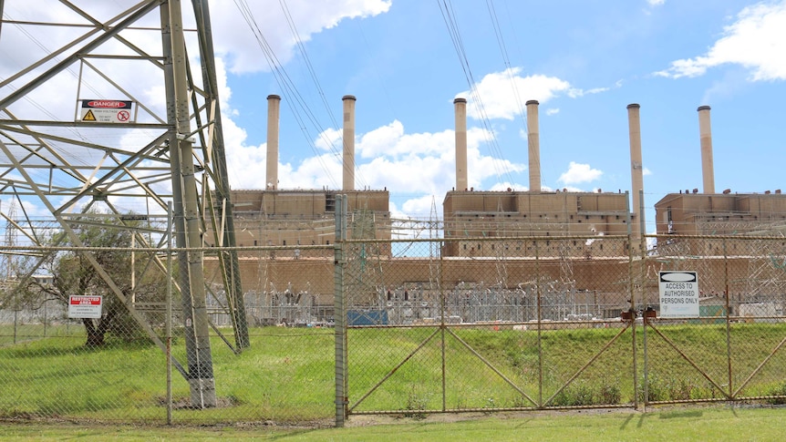 Hazelwood power station behind a transmission tower.