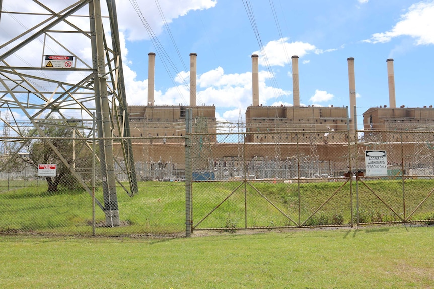 Hazelwood power station behind a transmission tower.