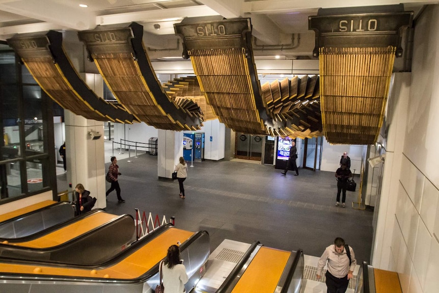 The combs of the Interloop sculpture suspended at Wynyard Railway Station.