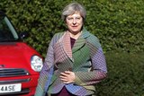Britain's Prime Minister Theresa May arrives for charity coffee event in Reading.