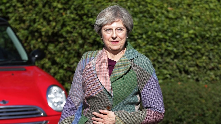 Britain's Prime Minister Theresa May arrives for charity coffee event in Reading.
