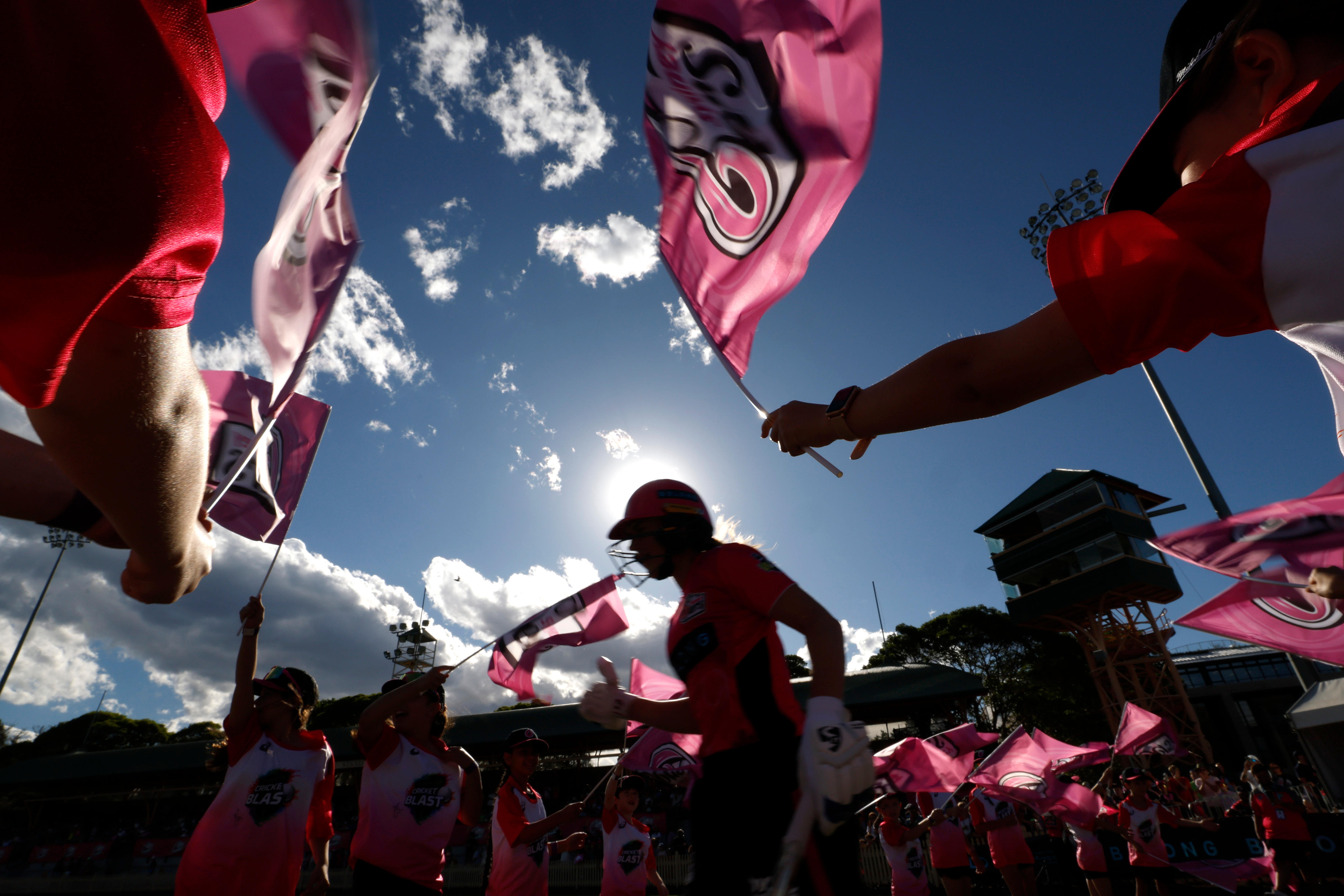 Fans wave flags