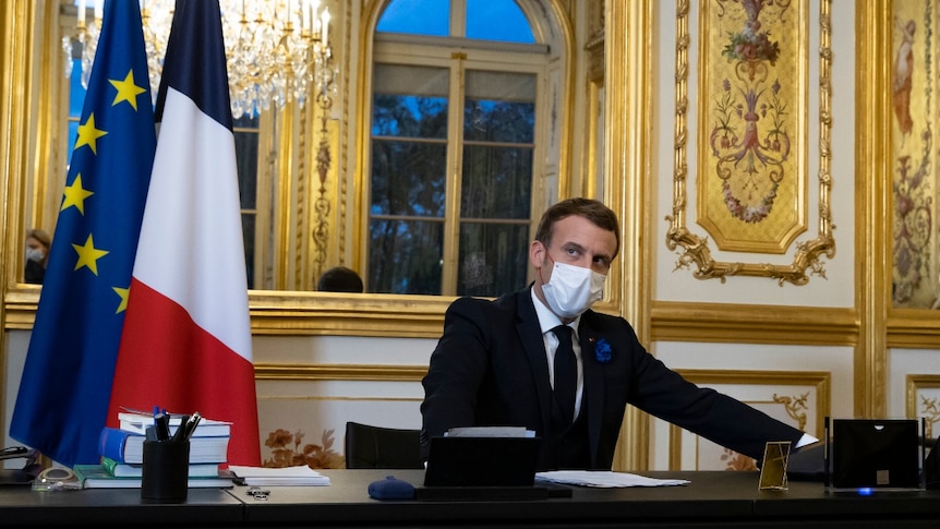 French President Emmanuel Macron speaks on the telephone to US President-elect Joe Biden