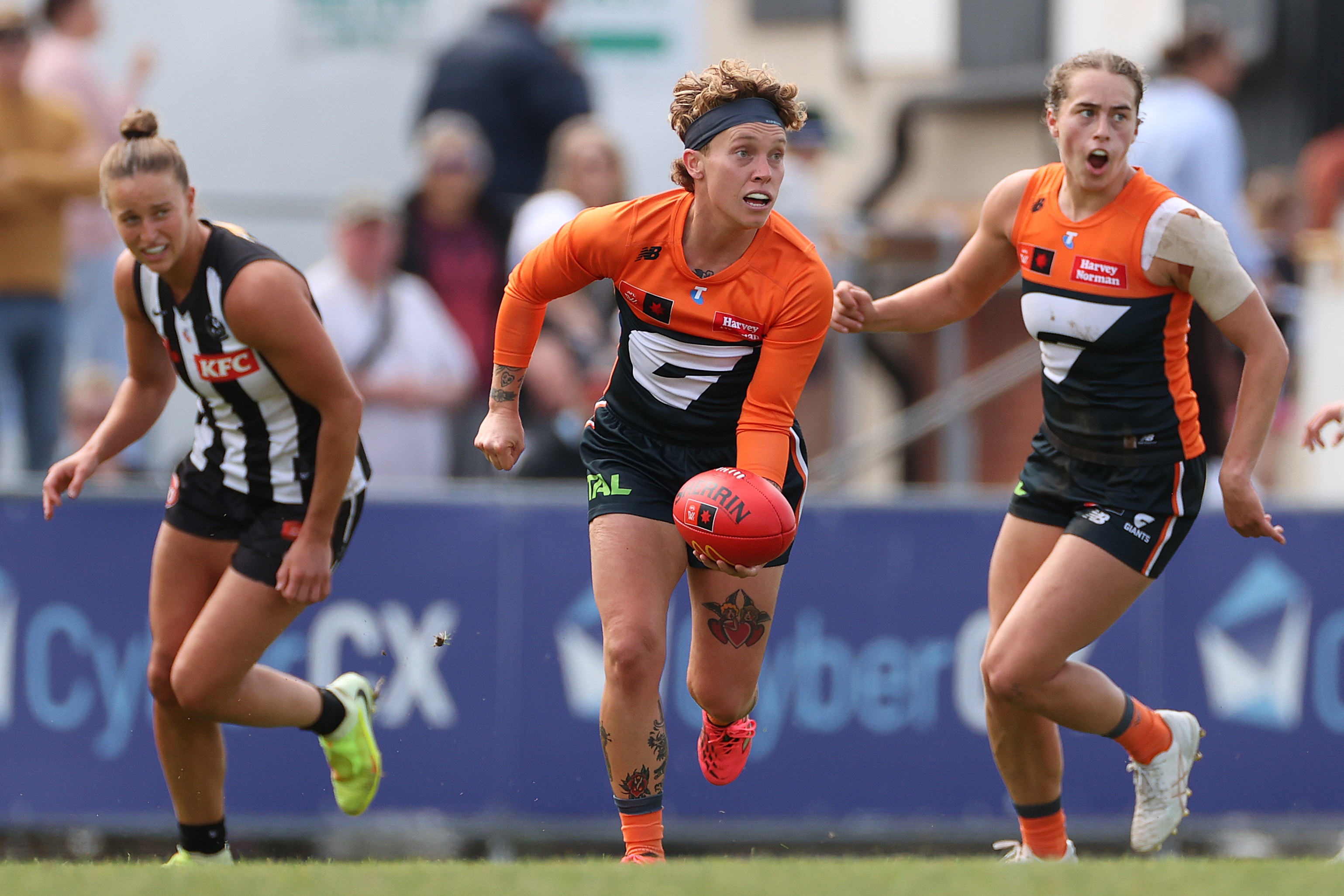 Tilly Lucas-Rodd of the Giants handballs.