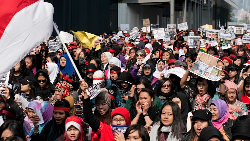 Thousands in Hong Kong rally to support a maid
