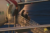 One of the accused arrives at Adelaide Airport