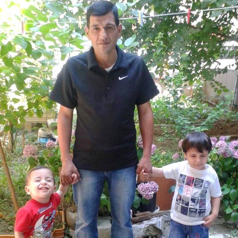 Abdullah Kurdi with his sons
