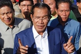 Cambodian Prime Minister Hun Sen gestures while speaking in Phnom Penh