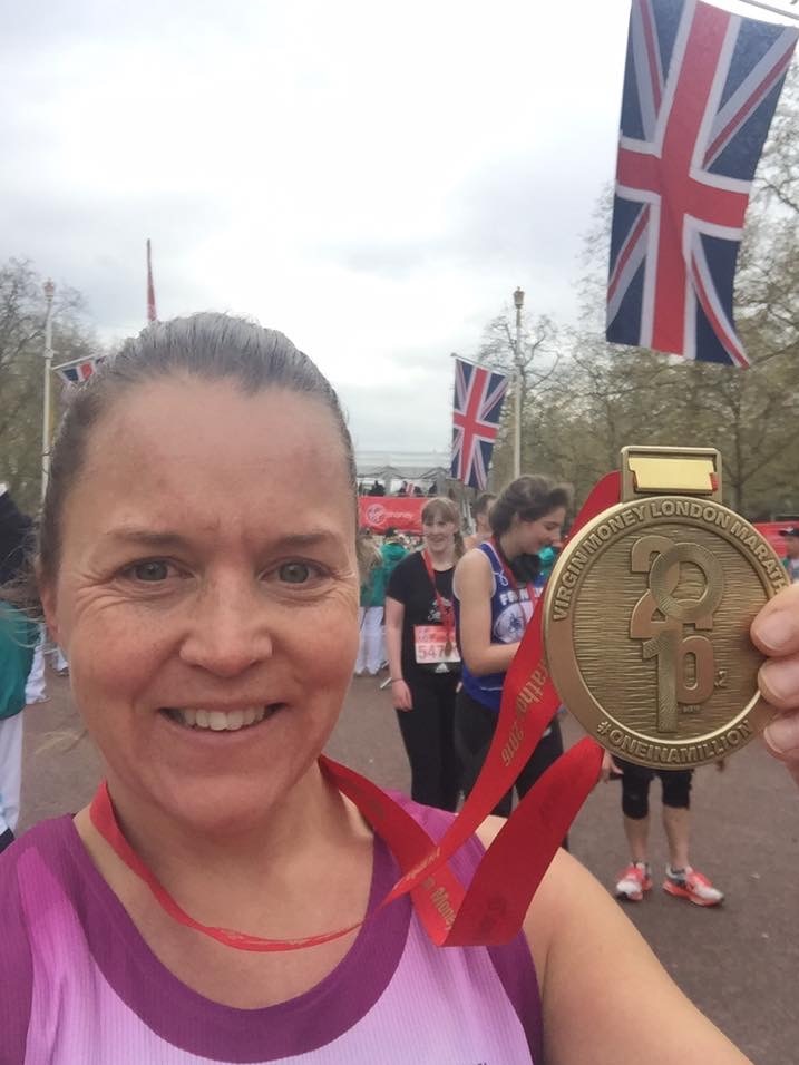 Sally Heppleston with her medal after completing the London Marathon.