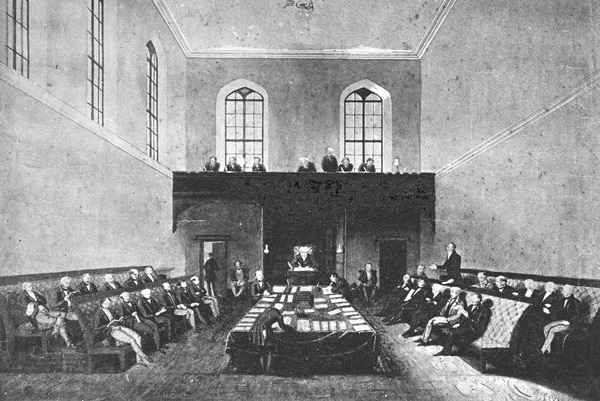 A black and white sketch of men gathered in parliamentary style in a large hall