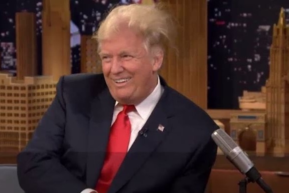Donald Trump looks away with his hair standing on end