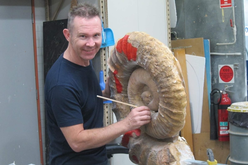 Jo Bain works on an Ammonite.