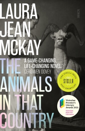 The Animals in That Country by Laura Jean McKay, a black and white image of a woman looking at a ram