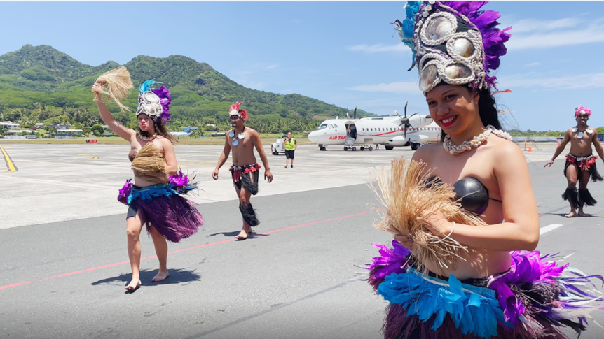 A woman in a coconut bra