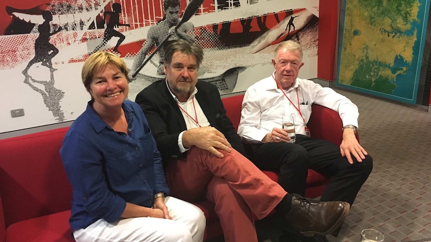 Bishop Terry Brady, Maxine Sharkey and Maurie Mulheron waiting in the 702 ABC Sydney lounge.