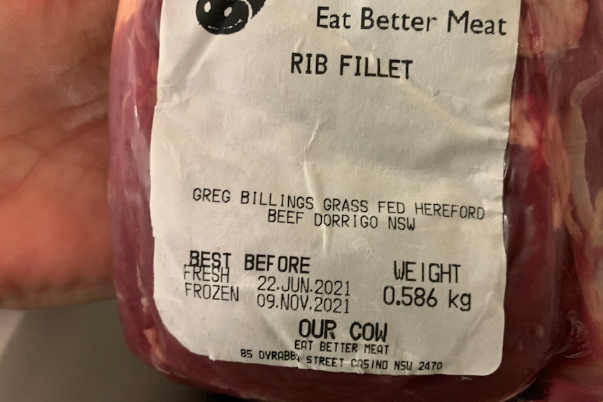 An image of a label on shrink-wrapped meat, reading 'rib fillet' and the name and location of the producer.