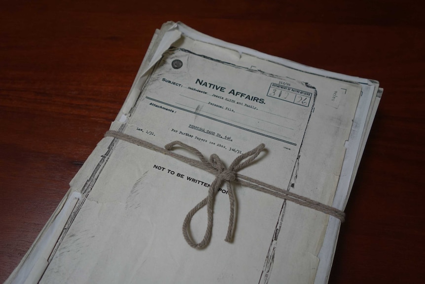 A bundle of documents tied up with a string, with the words 'Native Affairs' typed on the front.