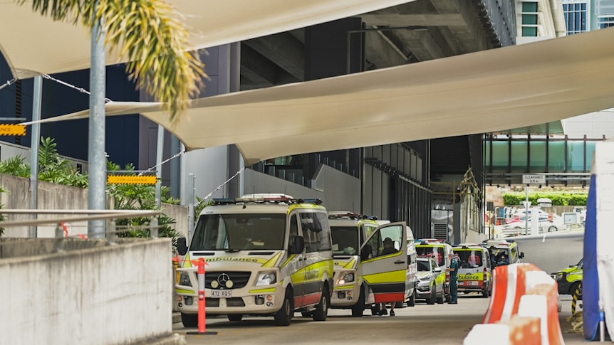 Ambulance vehicles lined up at RBWH building at Herston in Brisbane