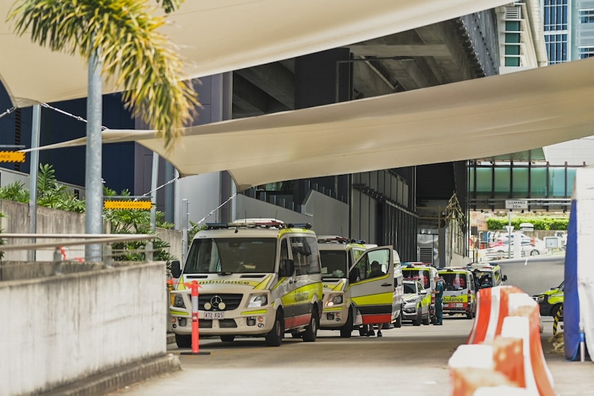 Ambulance vehicles lined up at RBWH building at Herston in Brisbane