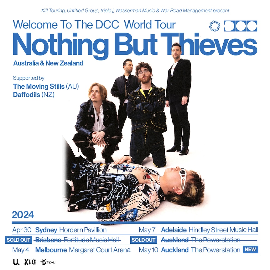 Nothing But Thieves tour poster shows the band in a white room with one lying on the floor and blue text around them