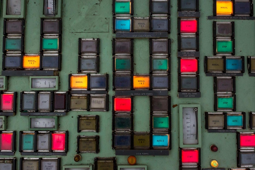 Multicoloured buttons on a Hazelwood power station control panel