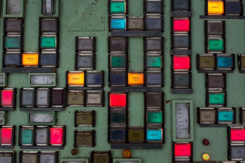 The multicolour buttons on a control panel