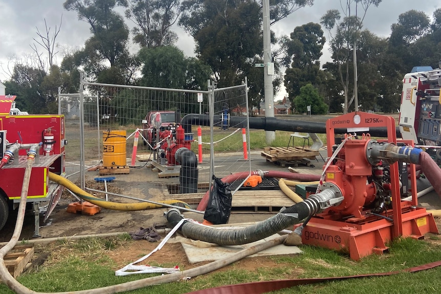 Machinery and pumps set up in a stormwater drain 