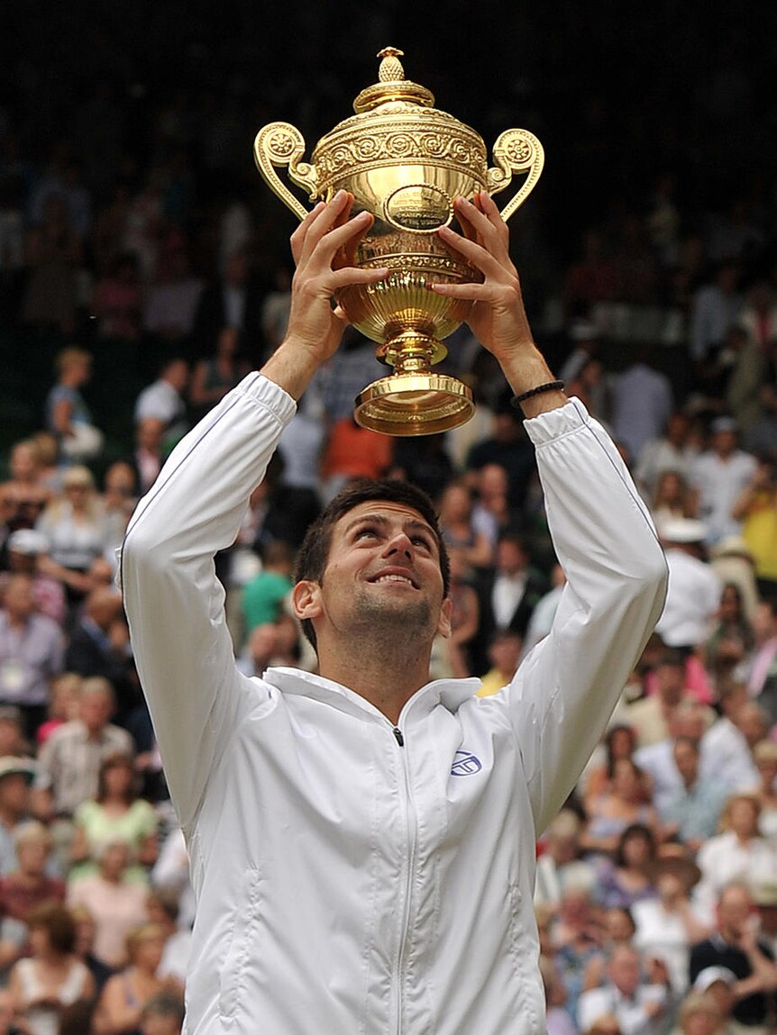Top of the world ... less than 24 hours after taking out Wimbledon for the first time, Djokovic was confirmed as the world number one.