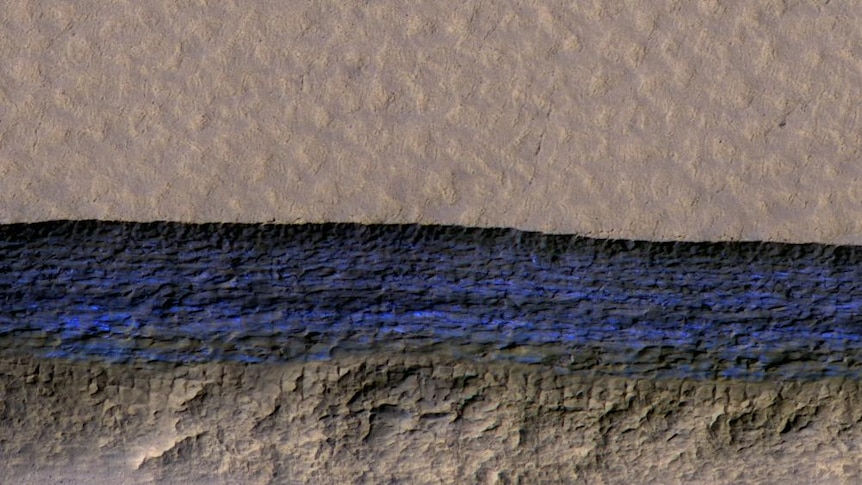 An aerial view of an ice deposit discovered on Mars, marked in blue.