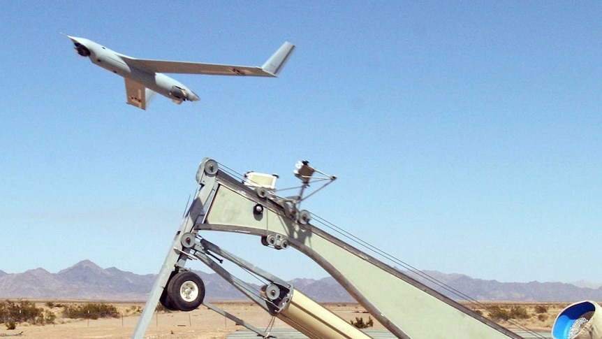 US defence personnel launch Boeing Scan Eagle drone