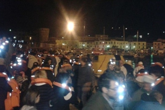 Cruise ship passengers evacuate the Costa Concordia