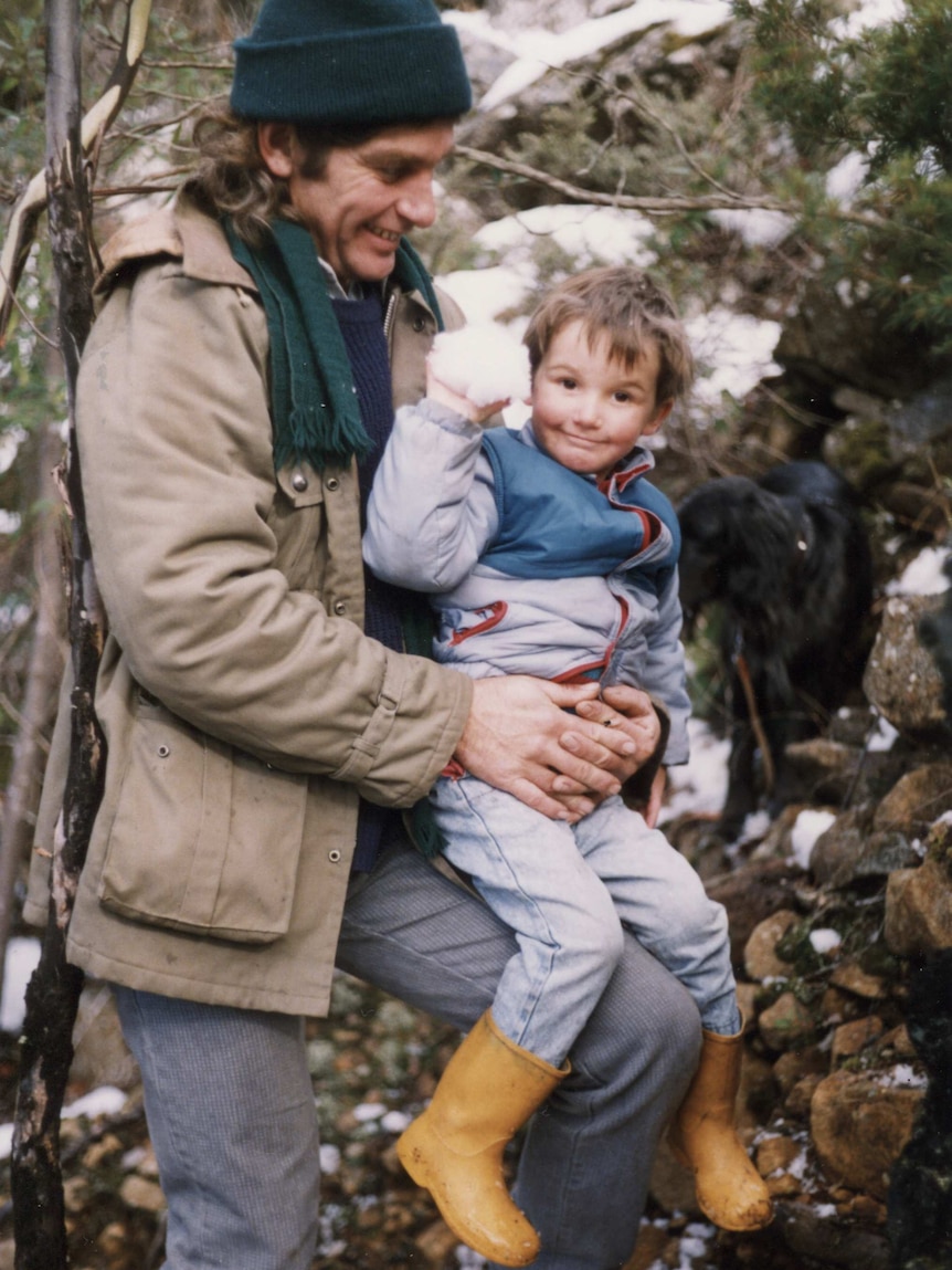 Josh Pringle as a child with his dad Bruce on kunanyi/Mount Wellington