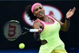 Serena Williams hits a forehand against Alison van Uytvanck