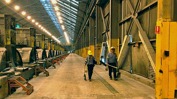 Workers at Alcoa's Point Henry smelter