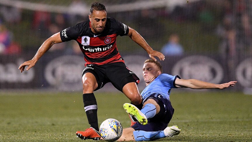 Tarek Elrich tries to beat a tackle playing for the Wanderers against Sydney FC in the FFA Cup semi-final.