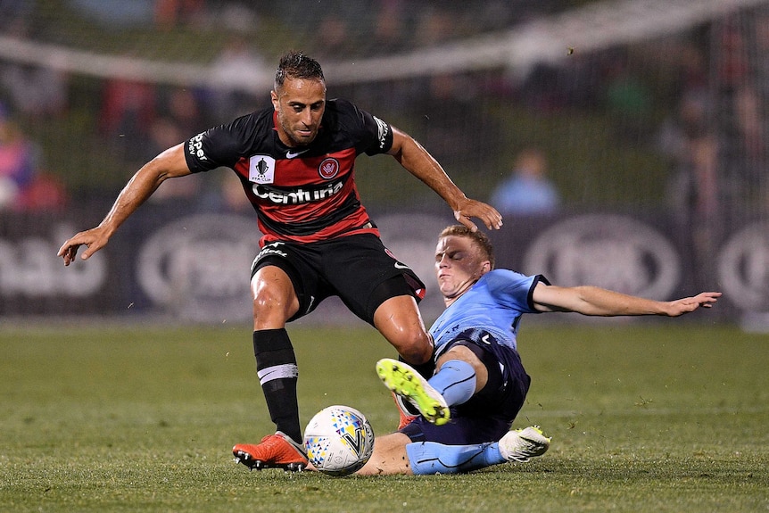 Tarek Elrich tries to beat a tackle playing for the Wanderers against Sydney FC in the FFA Cup semi-final.