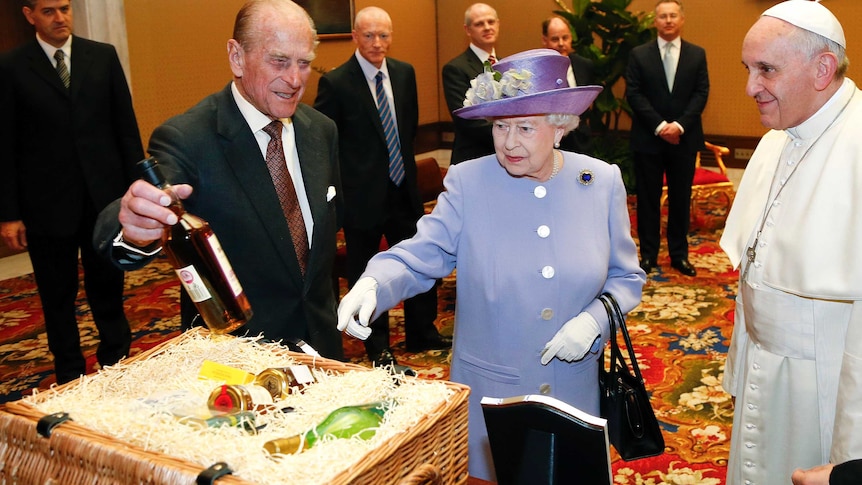 The Queen and Prince Philip present gifts to Pope Francis at the Vatican.