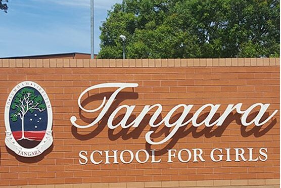 A school sign that says Tangara school for girls