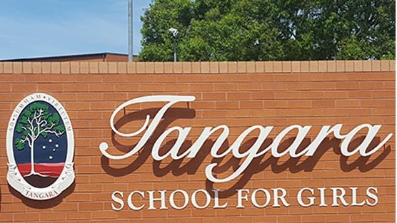 A school sign that says Tangara school for girls
