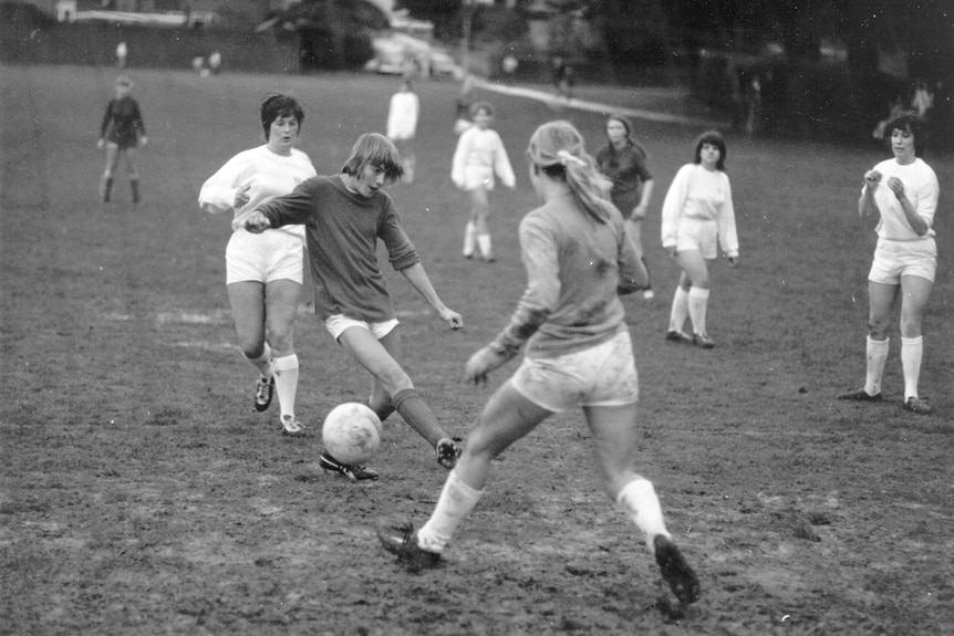Women playing football in 1970