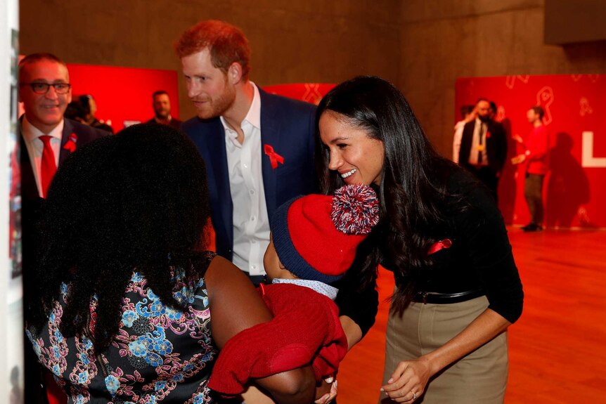 Prince Harry and his fiancee Meghan Markle at AIDS Day charity event