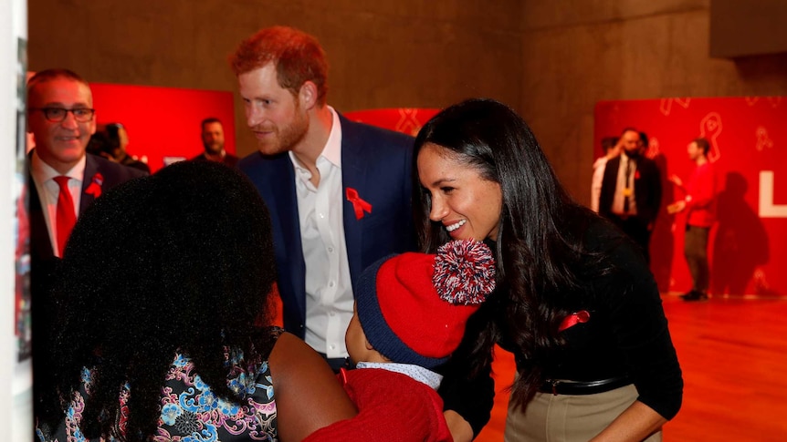 Prince Harry and his fiancee Meghan Markle at AIDS Day charity event