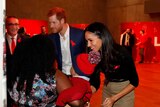 Prince Harry and his fiancee Meghan Markle at AIDS Day charity event