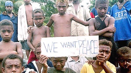 Solomons children with sign for peace