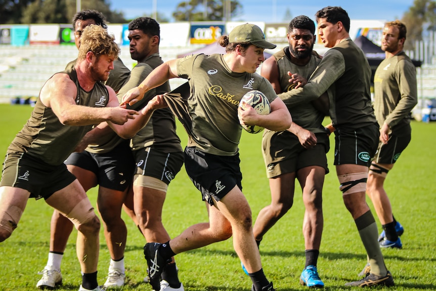 An action shot of the Wallabies in training