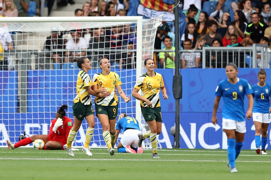 Caitlin Foord celebrates after scoring against Brazil