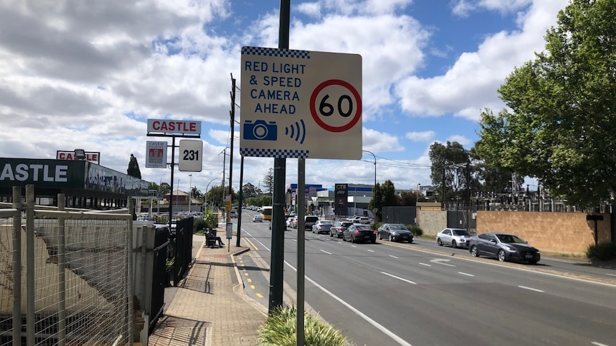 A red light and speed camera warning sign in Adelaide